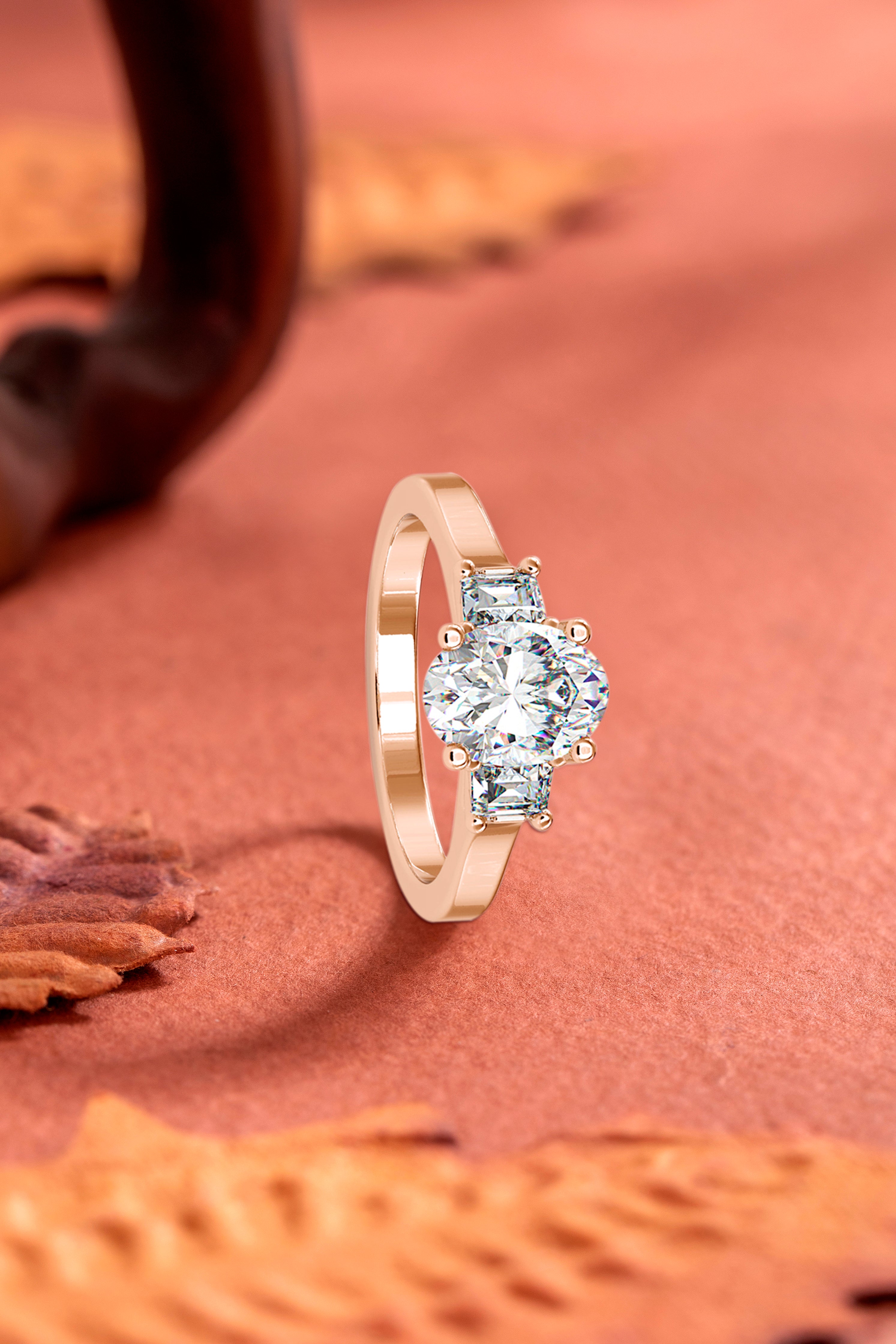 Sleek Sophistication: Oval Solitaire with Baguette Accents Audiam