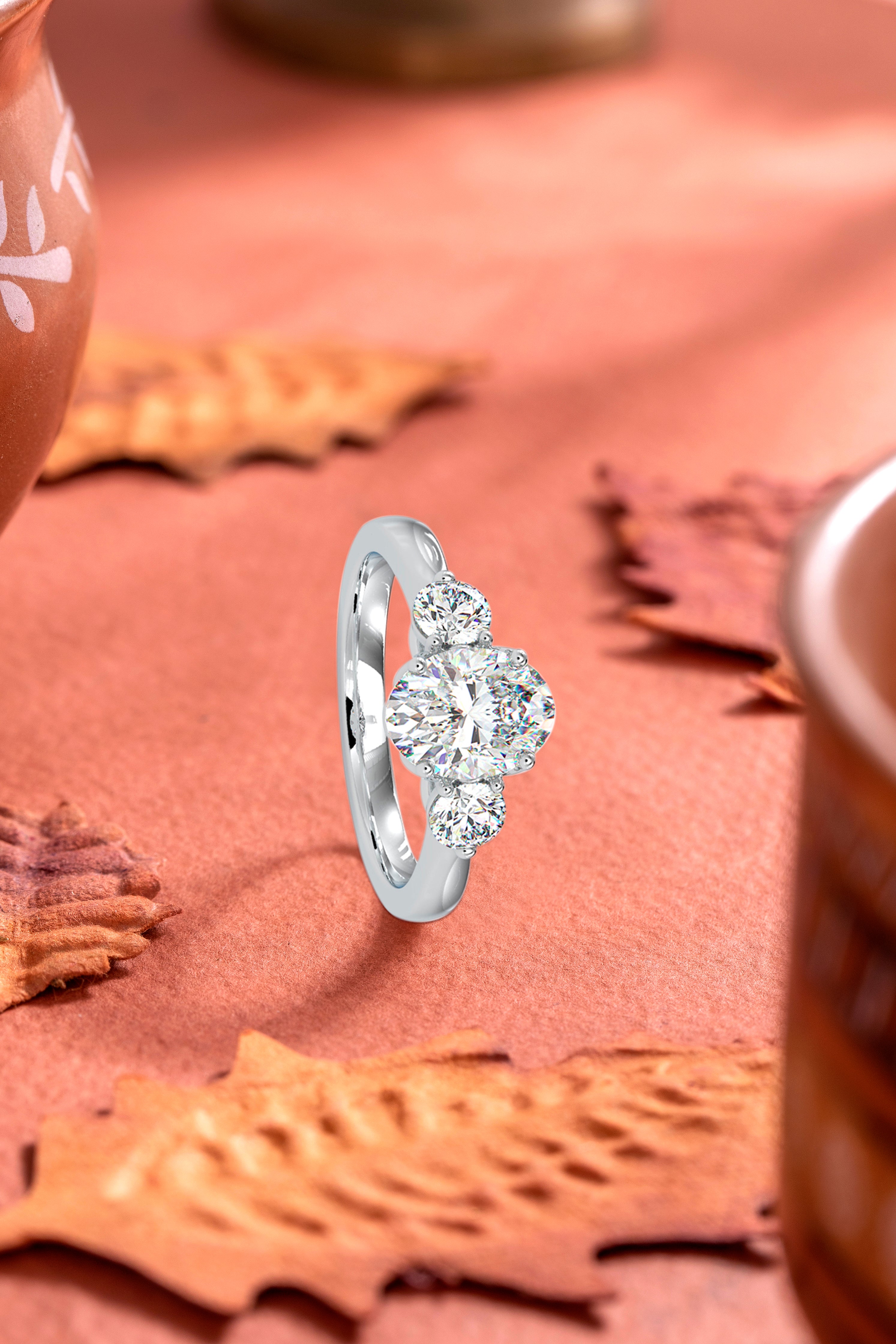 Eternal Harmony: Oval Diamond Ring with Round Brilliants Audiam