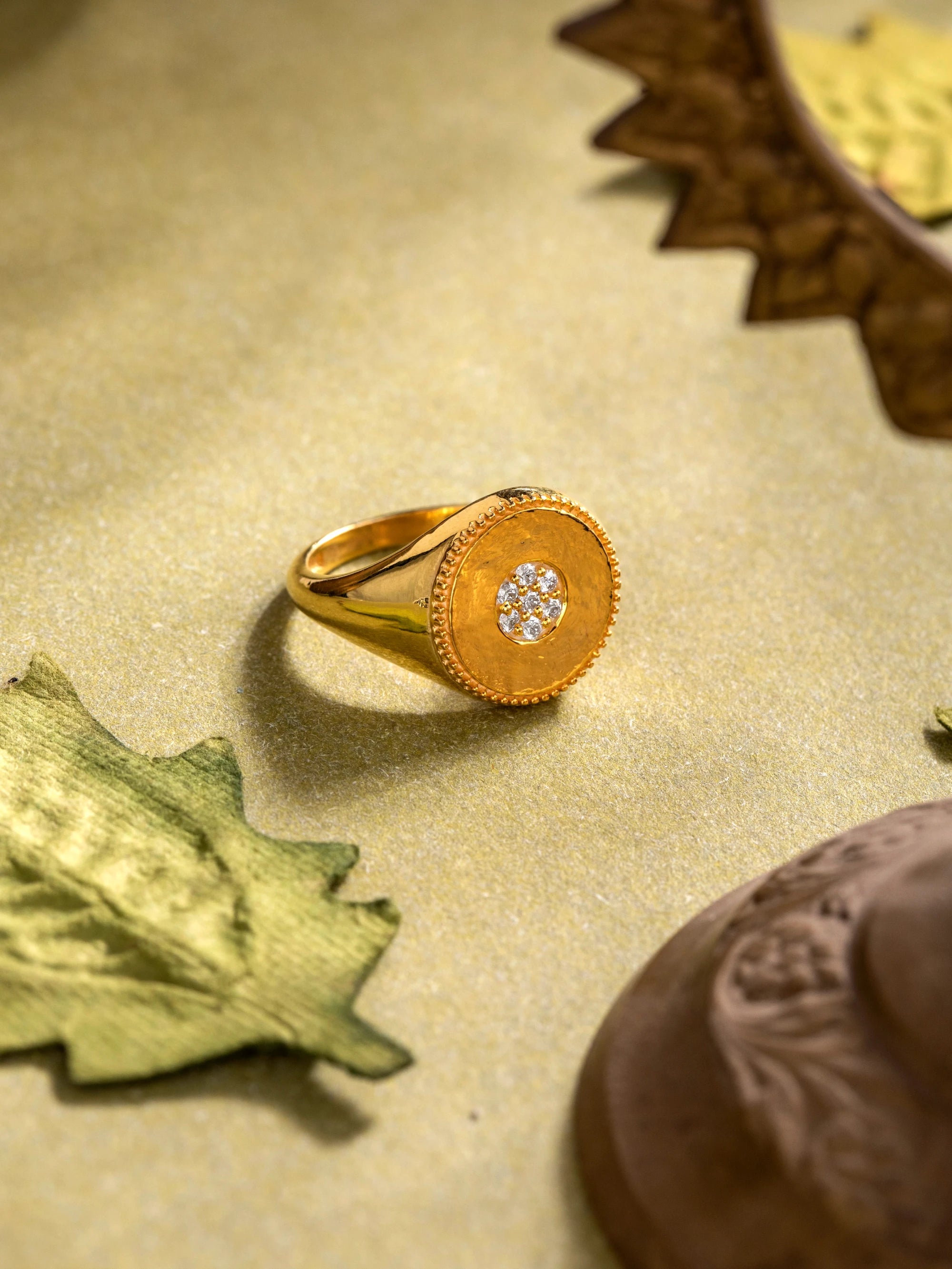 Luxurious Matte Gold Ring with Center Diamonds Audiam